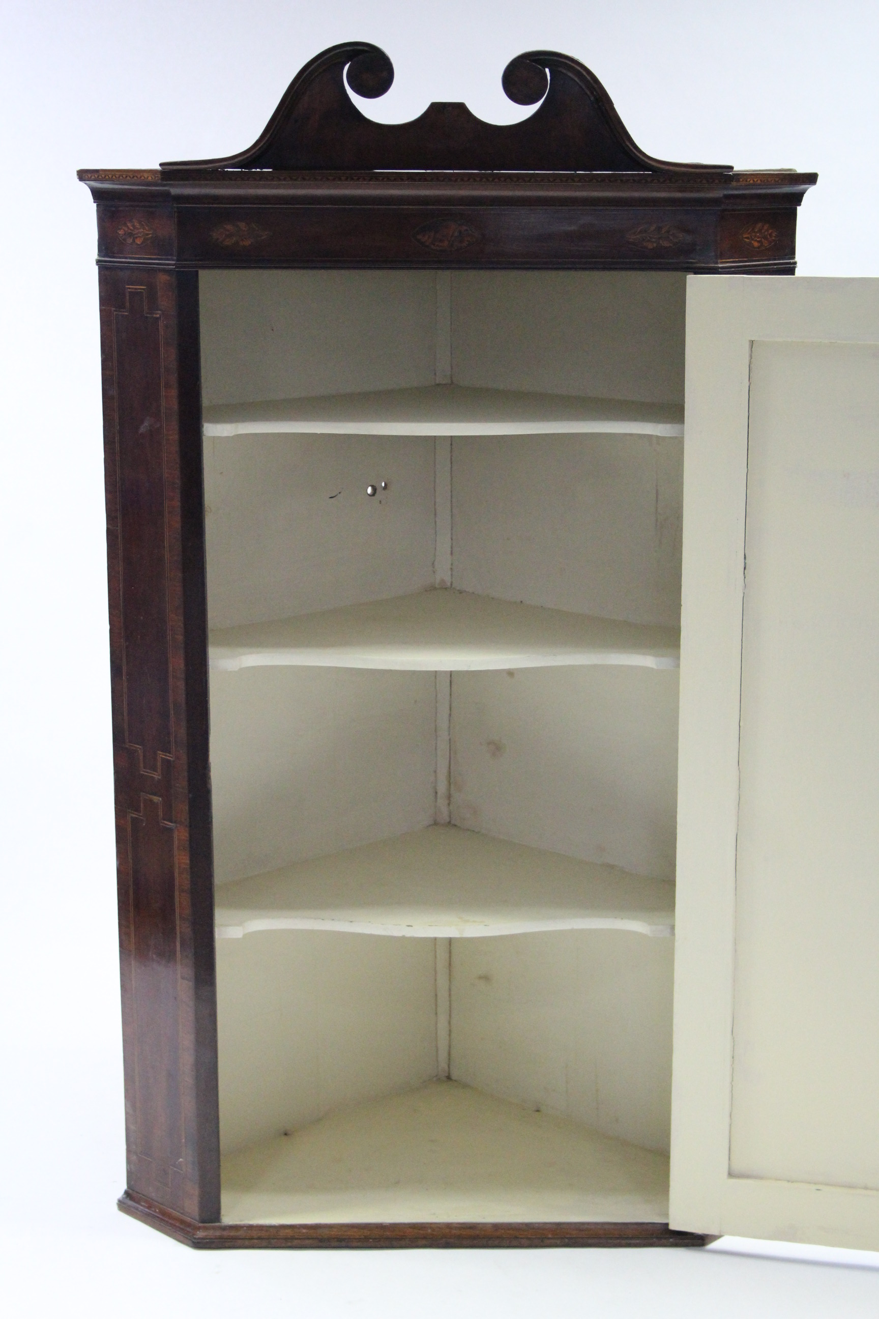 A late 18th century figured mahogany hanging corner cupboard with swan-neck pediment, marquetry - Image 2 of 2