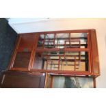 A Chinese hardwood tall china display cabinet (lacking glazed panels to doors & right-hand side),