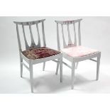 A pair of G-Plan painted mahogany rail-back dining chairs with padded seats & on square tapered