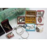 A 9ct. gold dress ring; a ditto bracelet; a sterling silver brooch; a ditto pair of earrings; &