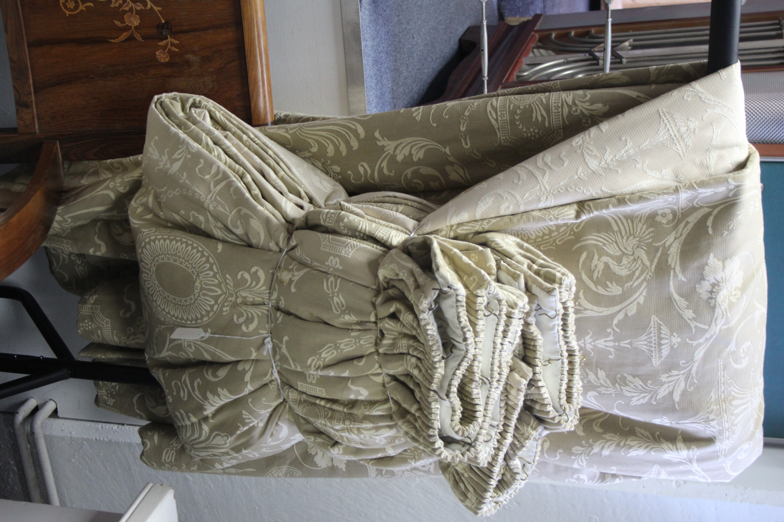 Two pairs of lined & interlined curtains of bronzed ground & with repeating cream geometrical