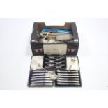Various items of plated & stainless steel cutlery, cased & uncased.
