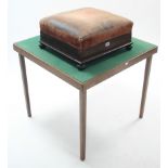 An early 20th century mahogany rectangular foot stool with padded seat, & on bun feet, 19” wide; & a