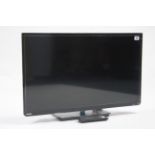 A Toshiba 31” LCD television with remote control. w.o.