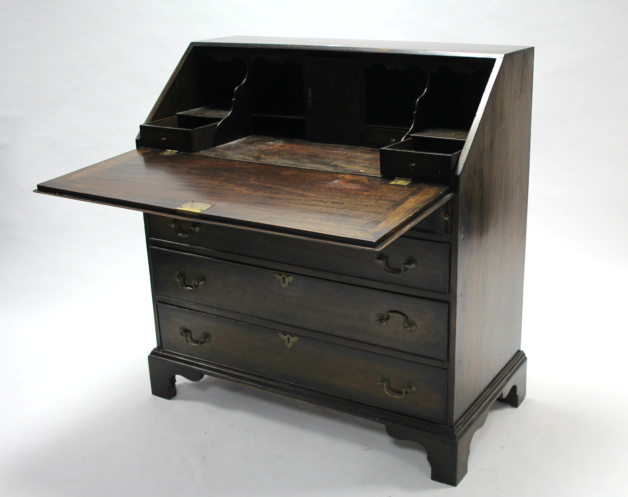 A 19th century mahogany bureau with fitted interior enclosed by fall-front above four long graduated - Image 2 of 3
