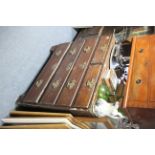 A 19th century oak chest fitted two short & three long graduated drawers with brass swan-neck