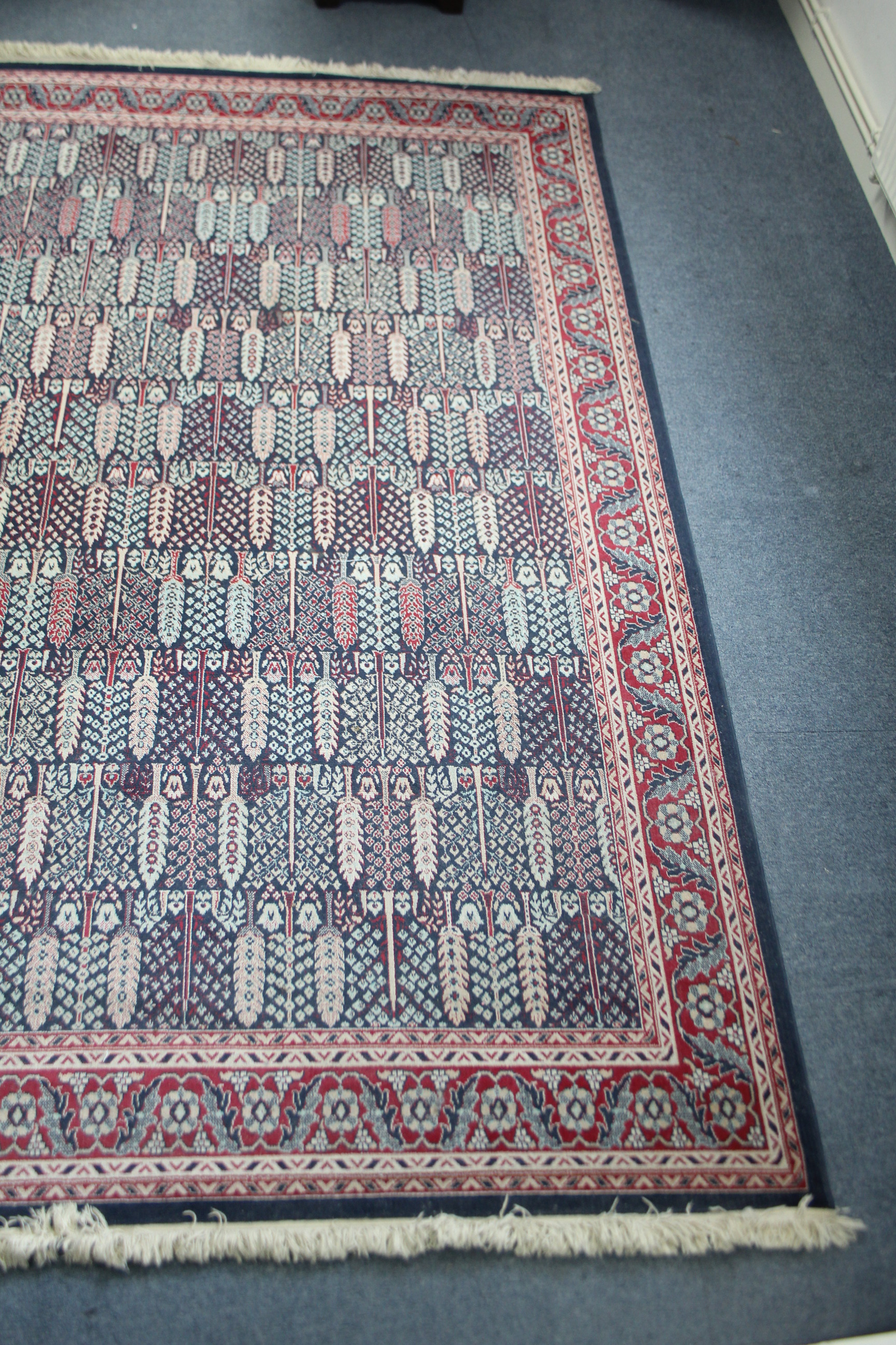 A small carpet of crimson & blue ground & with all-over repeating multi-coloured geometric design to - Image 3 of 4