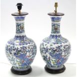 A large modern pair of oriental-style globular table lamps of white ground & with all-over multi-