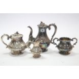 A silver plated four-piece tea & coffee service of globular form & with engraved foliate & scroll
