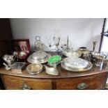 A Silver plated oval two-handled entrée dish, a plated table epergne; & various other items of