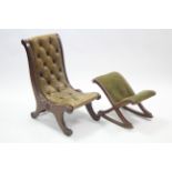 A mahogany frame nursing chair with buttoned all-in-one seat & back upholstered brown leather;