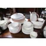 A Roya Doulton “Meadow Glow” pattern dinner & tea service of approximately seventy items