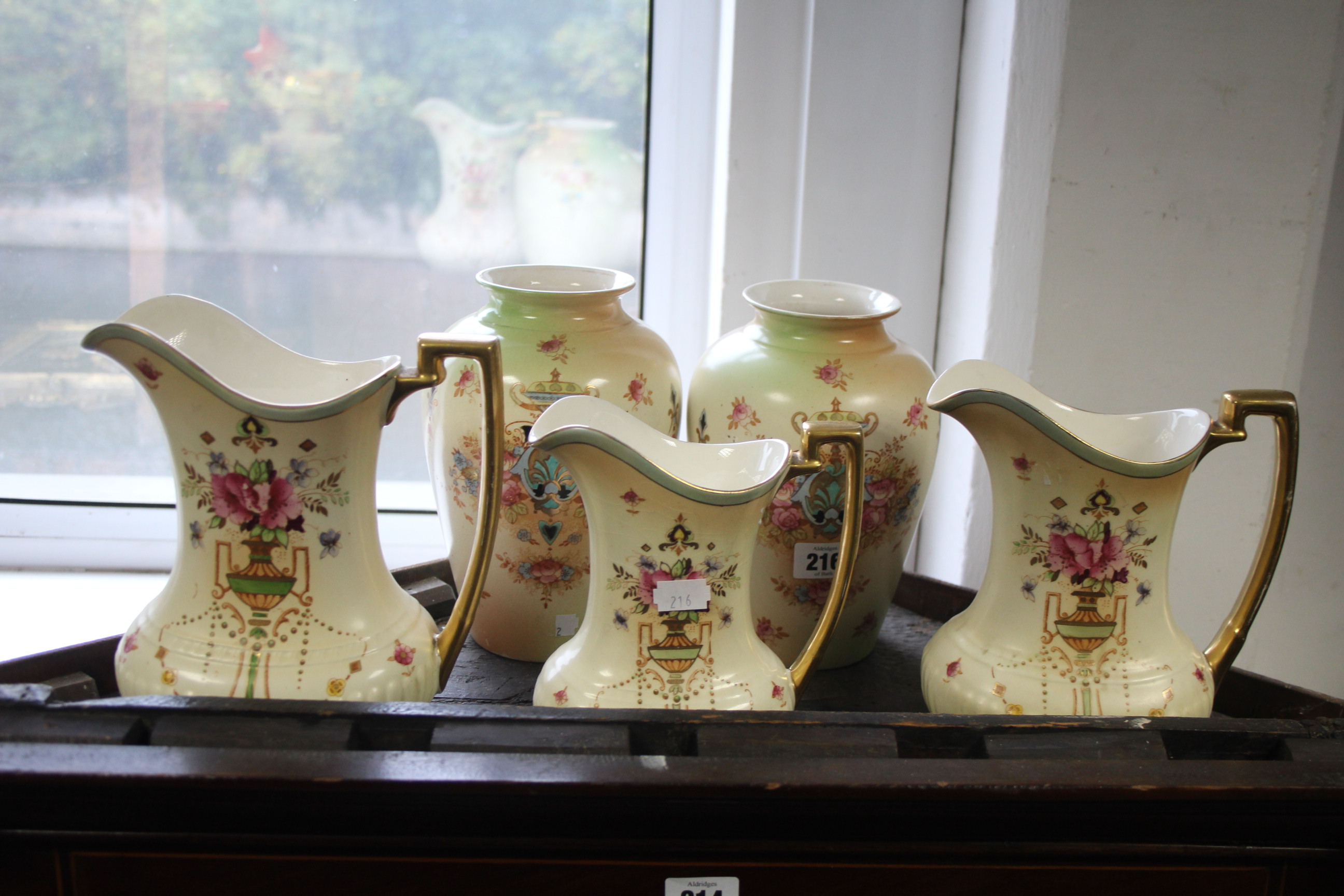 A pair of Fieldings Crown Devon “Wick” pattern ovoid vases, 7¾” high; & a set of three Fieldings