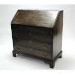 A 19th century mahogany bureau with fitted interior enclosed by fall-front above four long graduated