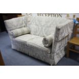 A Knole-style three-seater drop-end settee upholstered ivory & grey geometric material, 72” long.