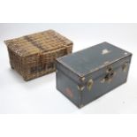 A fibre-covered & brass-studded travelling trunk with hinged lift-lid & leather side handles, 30½”