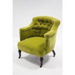 A Victorian buttoned-back armchair upholstered yellow velour, & on short turned tapered legs with