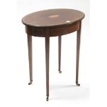 A late 19th/early 20th century inlaid-mahogany occasional table with shell motif to the oval