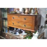 An African hardwood low chest fitted two long drawers with ring handles & on short cabriole legs &