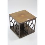 An Edwardian inlaid-mahogany table-top square revolving bookcase, 13¾” wide x 12¼” high.