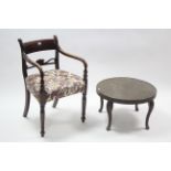 A regency mahogany bow-back carver chair with padded seat, & on ring-turned tapered legs (slight