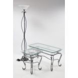 A silvered-metal rectangular low coffee table on shaped legs & with plate-glass top, 39” wide; a