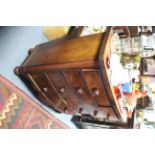 A Victorian mahogany bow-front chest fitted two short & three long graduated drawers with turned