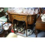 A late 19th/early 20th century mahogany break-front kneehole sideboard fitted long drawer to