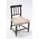 A 19th century inlaid-mahogany bow-back dining chair with padded seat &on square tapered legs with