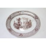 A 19th century china sepia printed “Medici” pattern oval meat plate, 17½” x 21¾”.