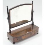 A 19th century mahogany rectangular swing toilet glass fitted three drawers to the box base, & on