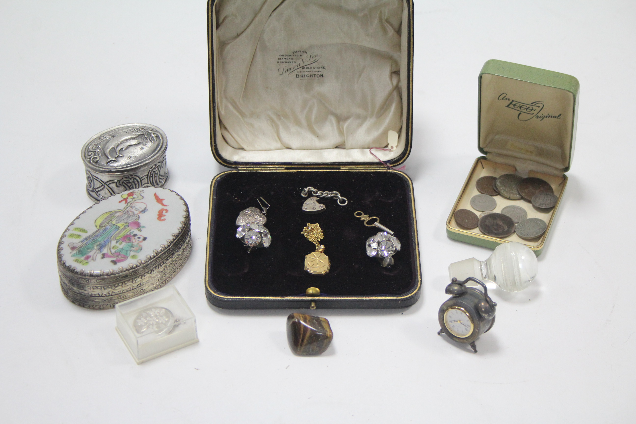 A small quantity of costume jewellery; two white-metal oval pill boxes, etc.