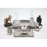 A silver plated four-piece tea & coffee service; two silver plated tea trays; two heavy cut-glass