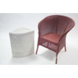 A Lusty’s Lloyd Loom white painted corner linen box; & a ditto pink basket chair.