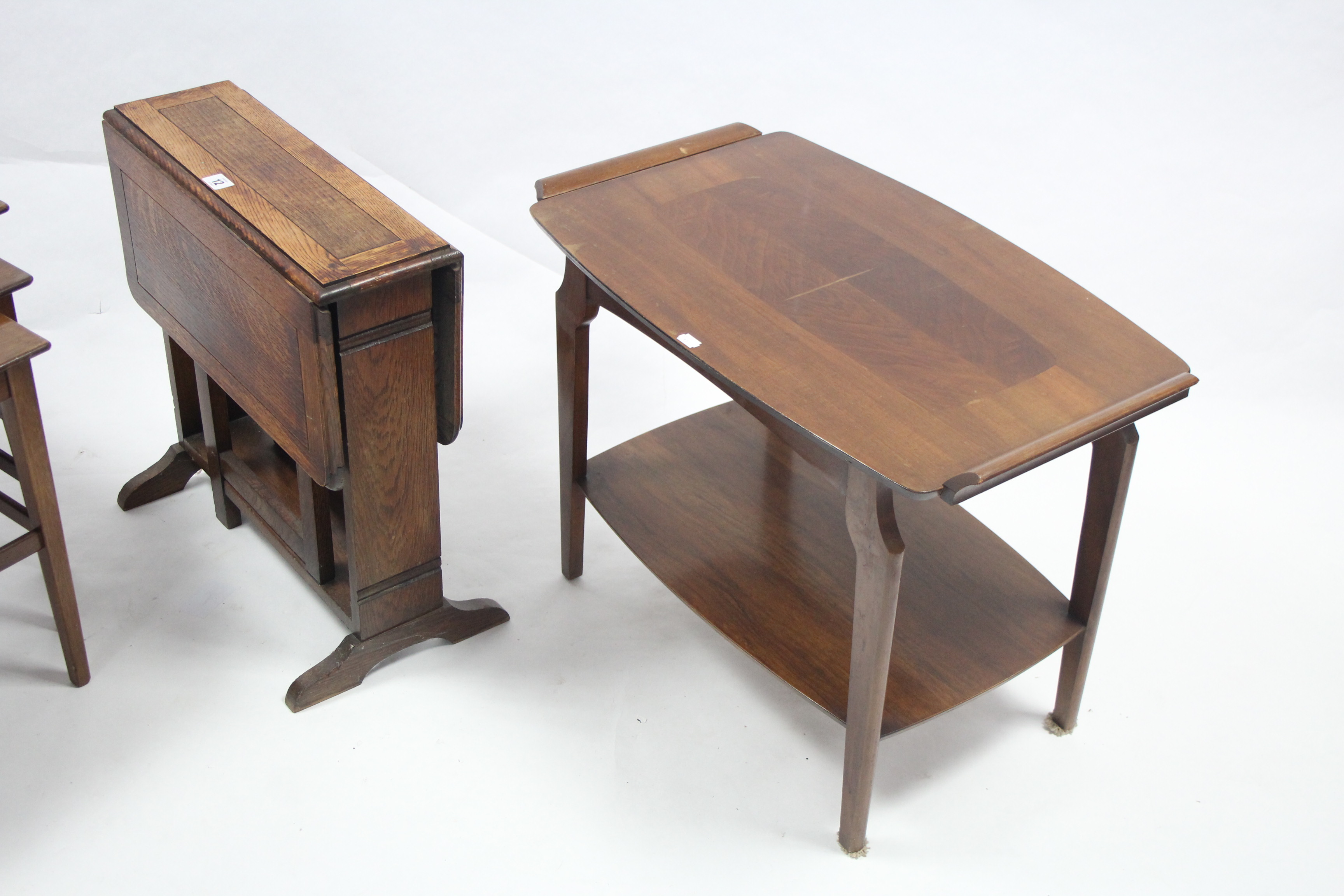 An oak drop-leaf occasional table, 19½” wide; together with a teak nest of three rectangular - Image 2 of 3