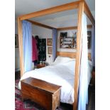 A Heals ash four-poster bed with panelled head-board & with square supports, 68” wide x 84” high. (