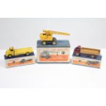 Three dinky die-cast scale models “Big Bedford Lorry” (No. 522), “Coles Mobile Crane” (No.