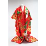 A modern Japanese Kimono of red ground & with all-over multicoloured silk embroidered floral