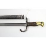 A LATE 19th CENTURY FRENCH RIFLE BAYONET, the 20½” long single-edge blade with French