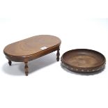 A mahogany and teak “apprentice piece” dining table with rounded ends to the rectangular top, and on