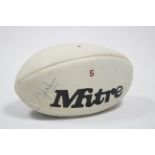 A Mitre size 5 rugby ball autographed by all the players of Bath R. F. C. from the season 1986-87.