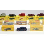 Sixteen modern Dinky die-cast scale model vehicles, all boxed.