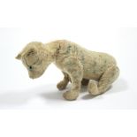 A Steiff automaton tiger with moving head & with button to ear, (worn), 9” wide.