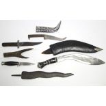 An Indian Kukri with leather sheath; & six various knives