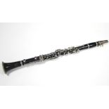 A Selmer “Studente Console” ebonised-finish clarinet with chrome plated keys, 26” long, lacking