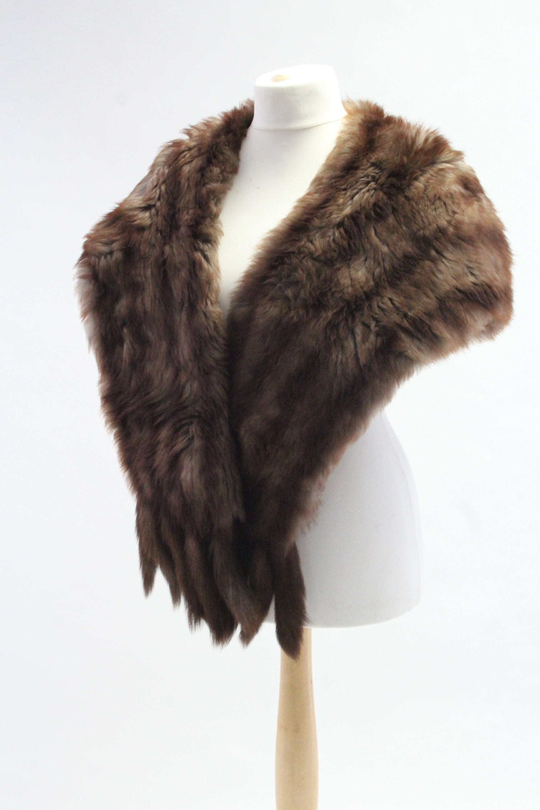 A Debella silk-lined fur shawl.