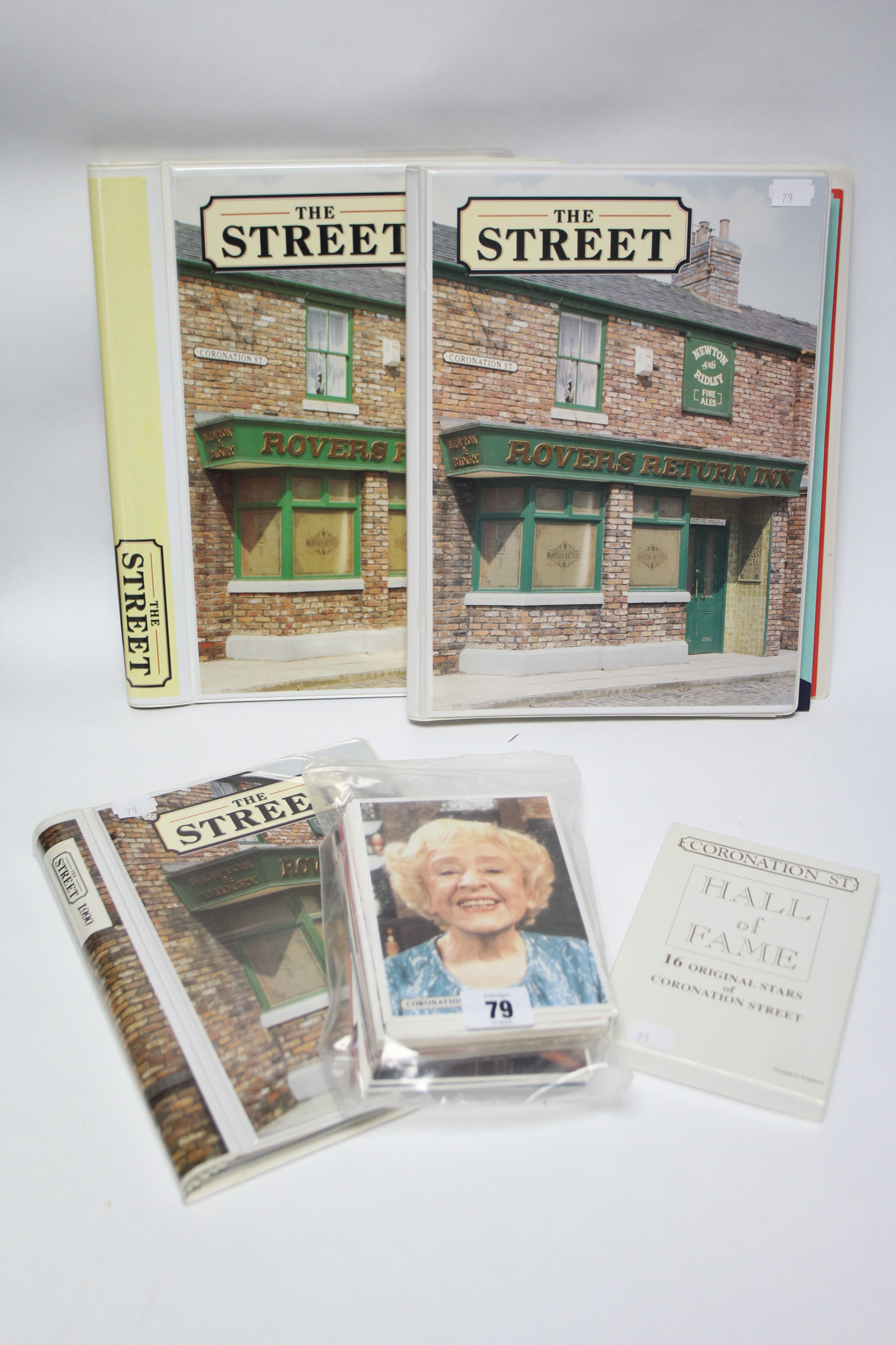 A set of sixteen “Coronation Street” Hall of Fame cards, boxed; sixty loose postcards of