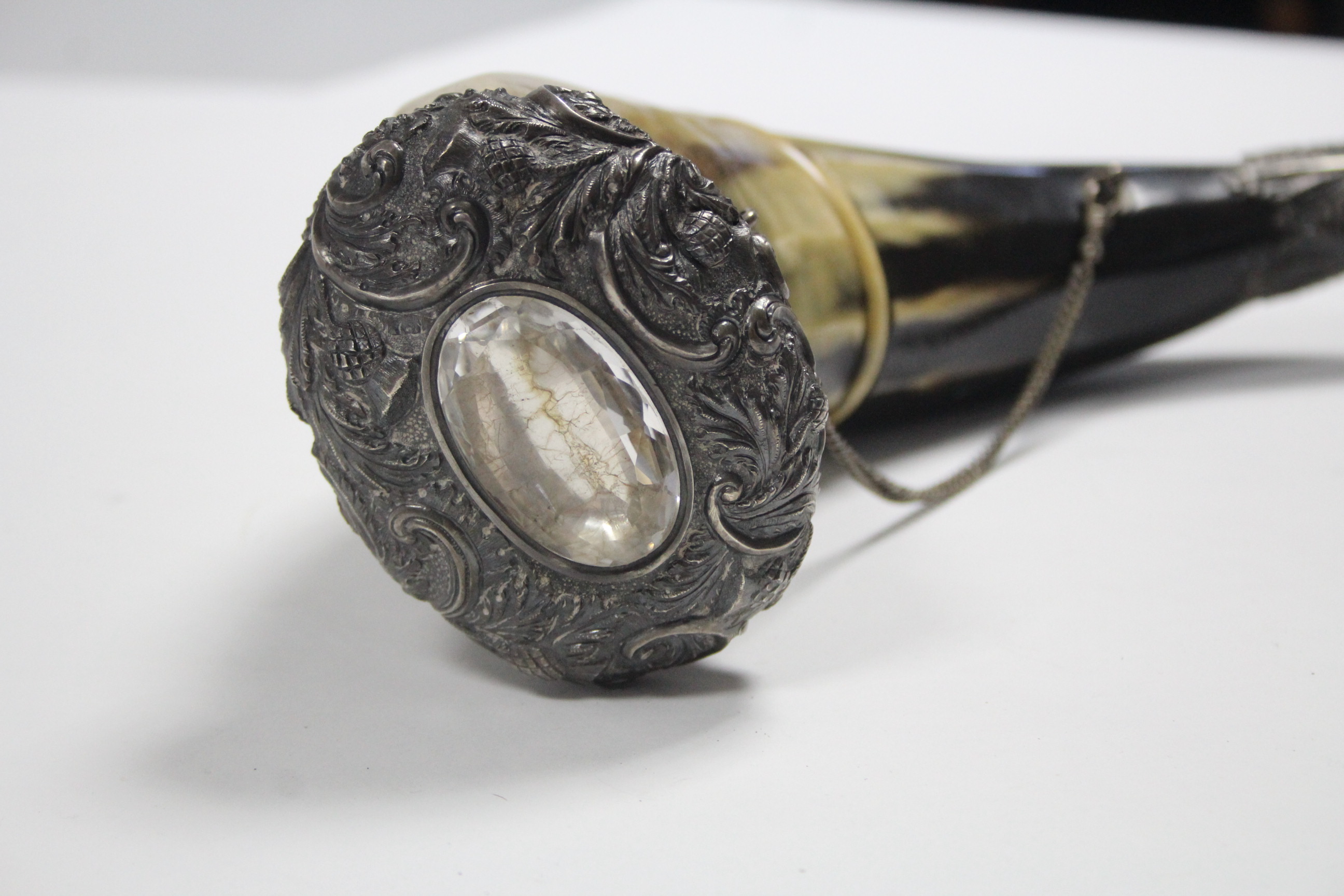 A Scottish large horn mull with white-metal mount to each end set with synthetic stone, 15½” long. - Image 2 of 3