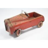 A 1950’s Tri-ang “Meteor” pedal car (red), 41” long, w.a.f.