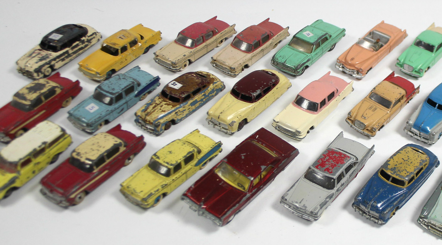 Thirty two various Dinky scale model cars including “Plymouth Fury” (No. 137); & “Cadillac Eldorado”